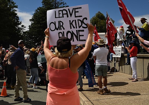 A protester makes her feelings known at the Convoy to Canberra rally at Old Parliament House on Saturday.