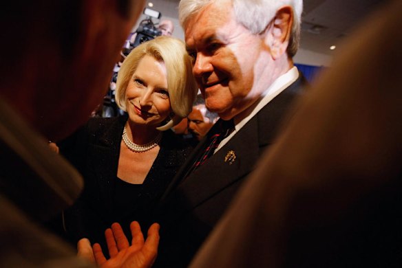 Republican presidential candidate Newt Gingrich and his wife Callista Gingrich talk with supporters
