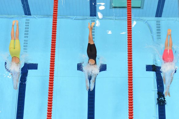 US swimmer Rebecca Soni (right), Denmark's Rikke Pedersen (centre) and Russia's Iuliia Efimova (left) compete in the women's 200m breaststroke final.