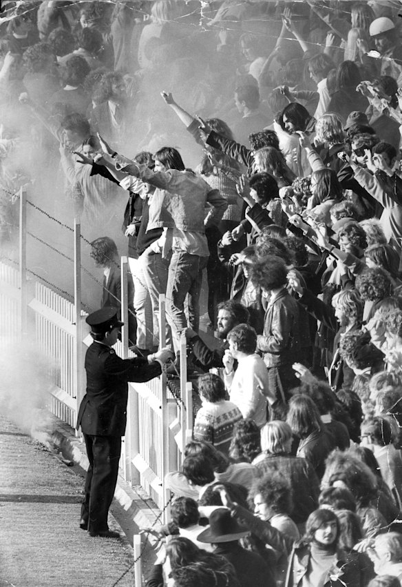 Anti-apartheid protesters flash mock-Nazi salutes during a match between the Springboks and Wallabies in July 1971.