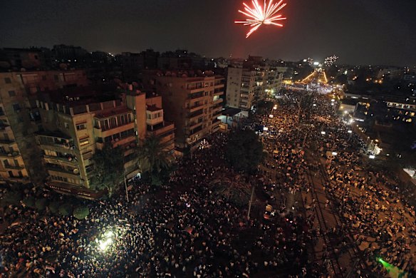Fireworks light the sky moments after Egypt's military chief announced President Mohamed Mursi would be replaced by chief justice of constitutional court outside the presidential palace in Cairo.