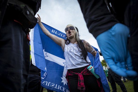 Police clash with protesters at the Shrine.