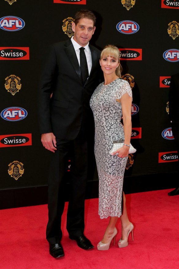 MELBOURNE, AUSTRALIA - SEPTEMBER 28:  Fremantle Dockers footballer Aaron Sandilands poses for a photo with his wife Jenny Sandilands on the red carpet ahead of the 2015 AFL Brownlow Medal count at Crown Palladium on September 28, 2015 in Melbourne, Australia.  (Photo by Pat Scala/Fairfax Media)