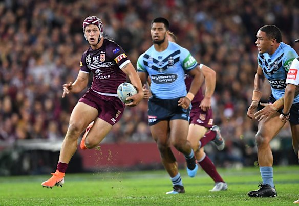 Kalyn Ponga of the Maroons in action.