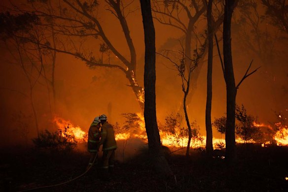 NSW RFS Crews struggle to save a home near Dargan on the Bells Line of Road.