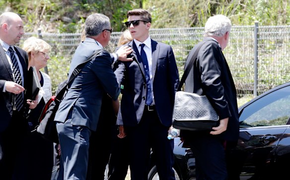 Phillip Hughes funeral at Macksville High School. Dean Jones speaks with Sean Abbott, the bowler of the fatal ball. 
Photo: Edwina Pickles. 
3rd Dec 20014.