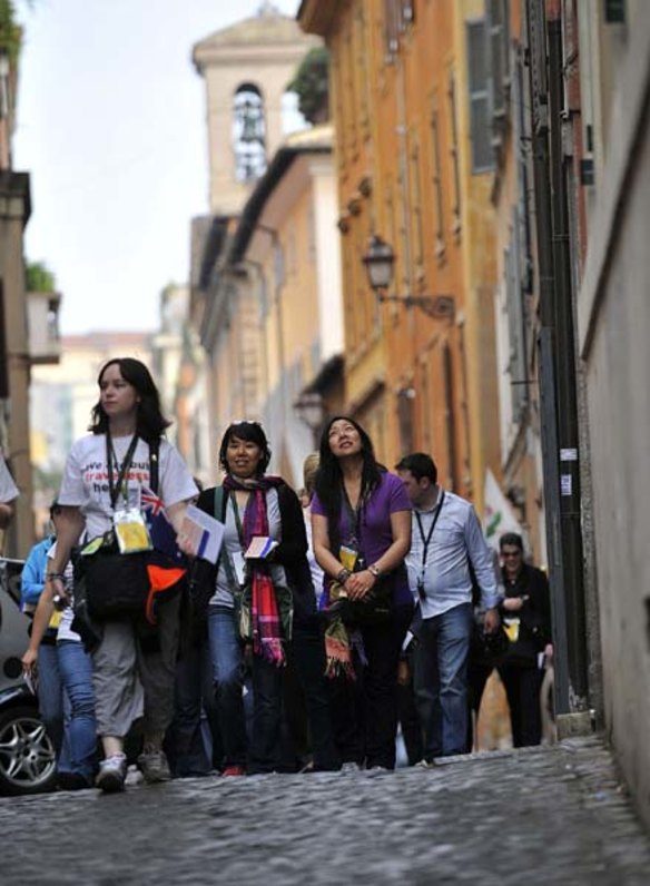 Pilgrims walk in the streets of Rome for the canonisation of Mary MacKillop.