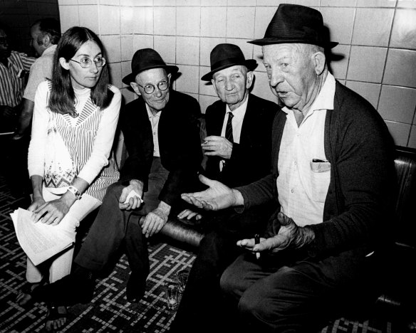 A Women’s Liberation campaigner with male drinkers in the (men only) public bar at the Burwood Hotel on December 13, 1972.