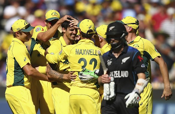 MELBOURNE, AUSTRALIA - MARCH 29:  Mitchell Johnson of Australia celebrates after taking the wicket of Kane Williamson of New Zealand  during the 2015 ICC Cricket World Cup final match between Australia and New Zealand at Melbourne Cricket Ground on March 29, 2015 in Melbourne, Australia.  