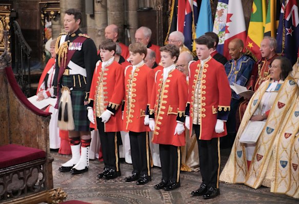 Page boys Prince George (centre), Lord Oliver Cholmondley, Nicholas Barclay and Ralph Tollemache take part in the coronation.