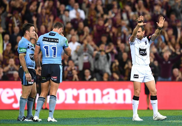 James Maloney of the Blues (left) is sent to the sin bin in the first half.