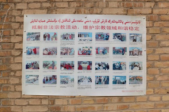 A poster at a local village mosque in Kuibagh village shows religious practices that are not forbidden.