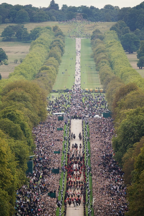 The ceremonial procession of the coffin of Queen Elizabeth II travels down the Long Walk as it arrives at Windsor Castle for the committal service at St George’s Chapel.