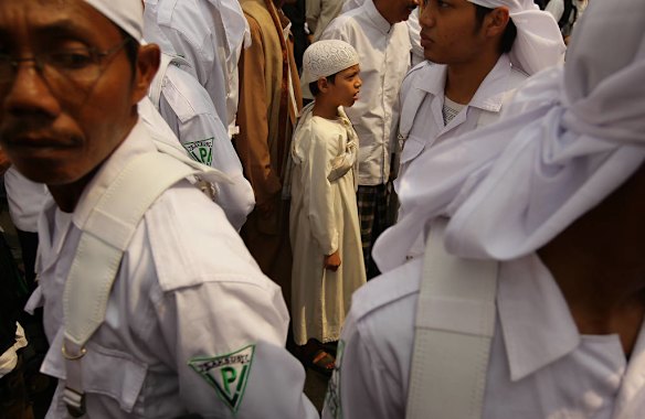 Hundreds of protestors gathered for anti US protests at the Bunderan Hotel Indonesia traffic circle in Central Jakarta, Indonesia.