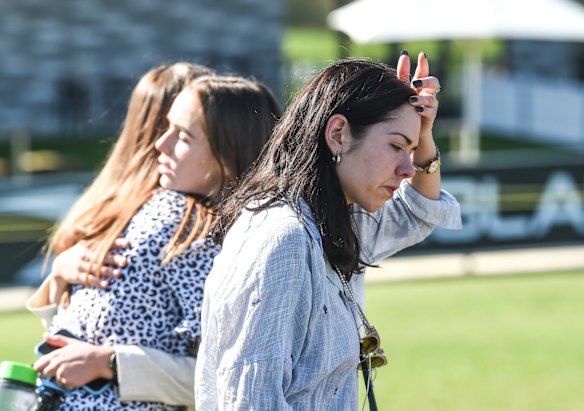 
Fans gather to watch the broadcast on the oval.