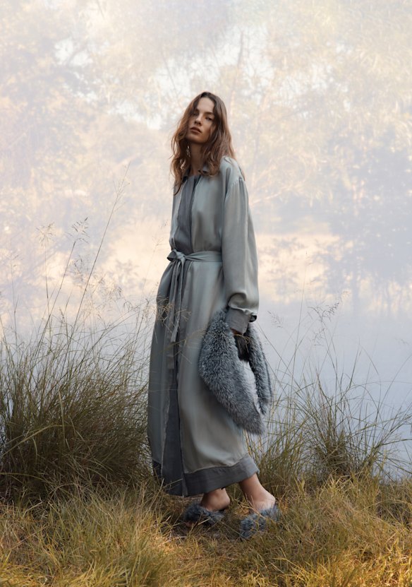 Christopher Esber “Retract” coat, $2695. Scanlan Theodore faux fur collar, $600, and faux fur shoes, $650.