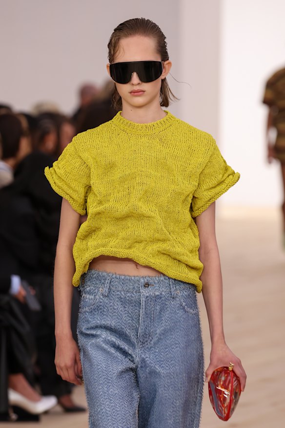 A chartreuse top on the Loewe runway at Paris Fashion Week.