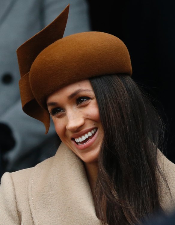 Meghan Markle's hat is by Philip Treacy, one of the Royal Family's preferred milliners. 