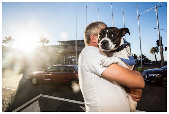 Neil carries Miss Maudie when she gets a bit tired after their walks. 