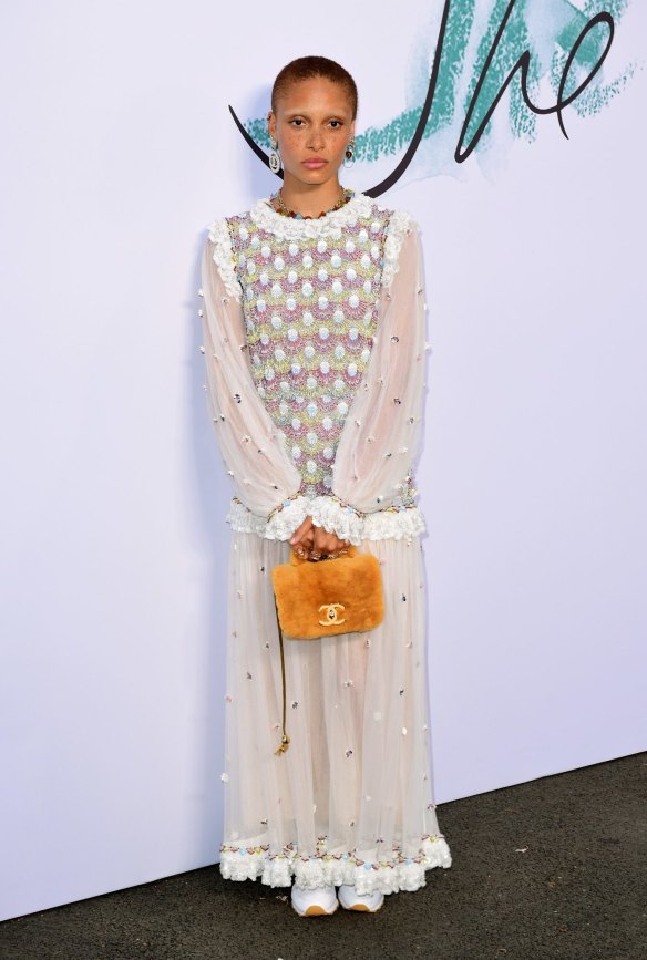 Adwoa Aboah pairs her boho dress with runners for a twist on the trend.