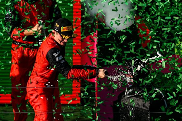 Charles Leclerc celebrates a win.