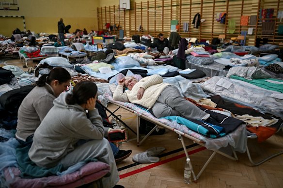 Women and children who have fled Ukraine take shelter in a primary school close to the Ukrainian border in Przemysl, Poland. 