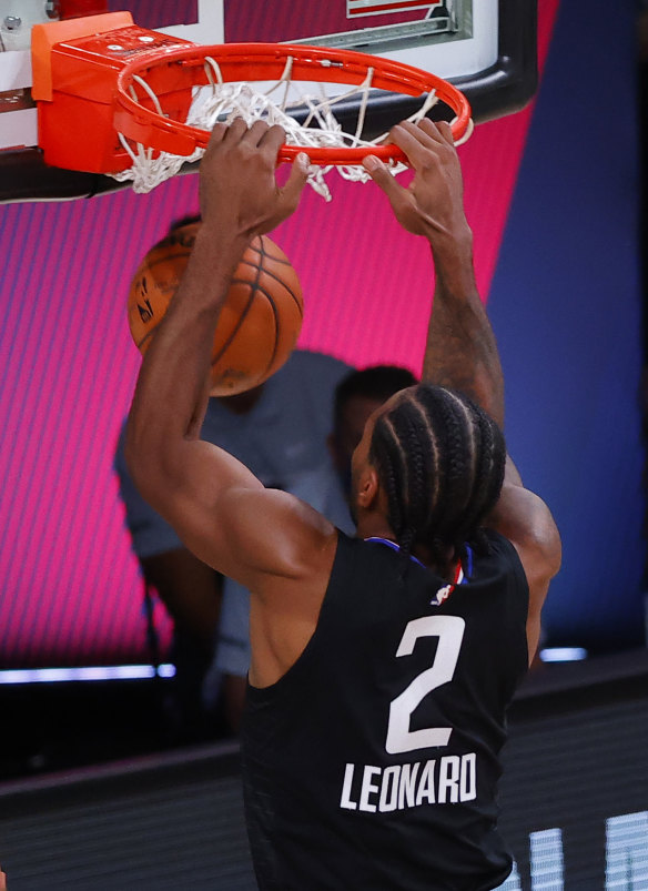 Kawhi Leonard of the LA Clippers dunks against the Mavericks in game six. 