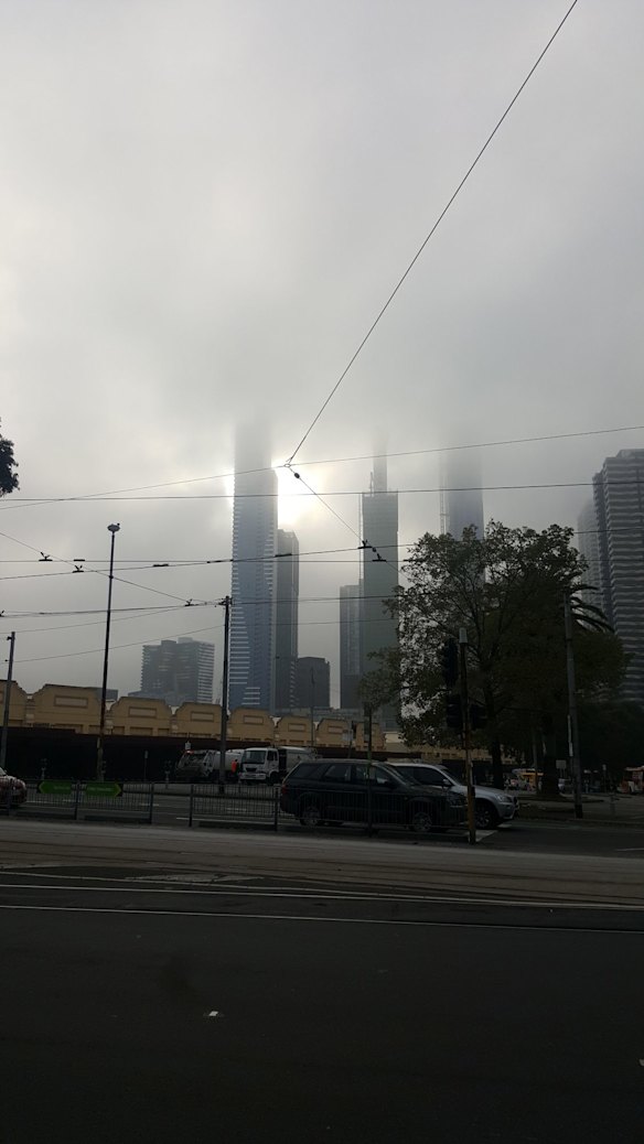 The sun tries to barge through fog over the Queen Victoria Market on Wednesday.