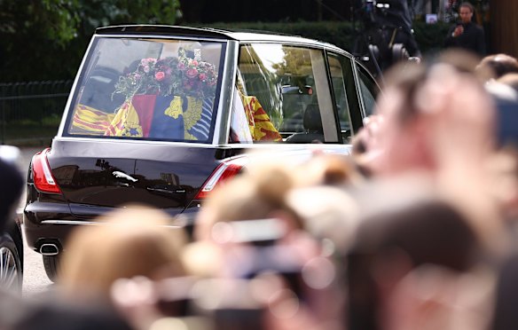 The Queen's coffin in the Royal Hearse leaves Wellington Arch.
