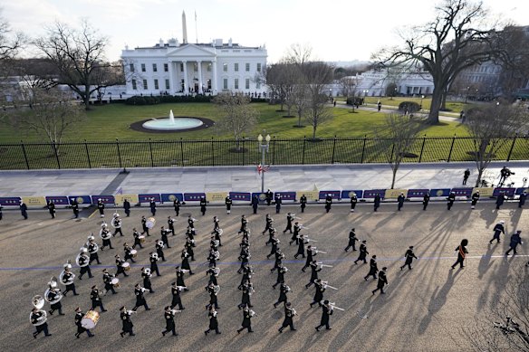 A U.S. Army band marches near the White House during the Presidential Escort, part of Inauguration Day ceremonies, Wednesday, Jan. 20, 2021, in Washington. 