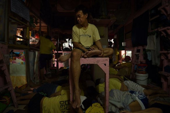 Inmates in a cell for inmates not associated with gangs in Quezon City Jail, Manila, Philippines.