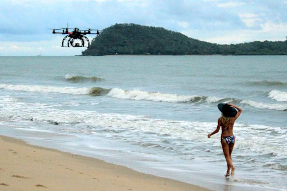 A flying drone is used during a fashion shoot.