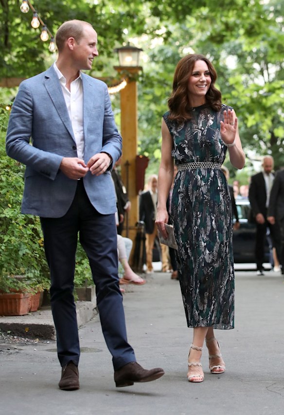 July 20- The Duchess attended a reception in Berlin's Clärchens Ballhaus,one of the nation's oldest and last remaining dance halls, wearing a sleeveless Markus Lupfer dress which featured overlapping silver and black birds over a green background. She complemented the dress with her new go-to scalloped Prada heels and a chain link silver belt.
