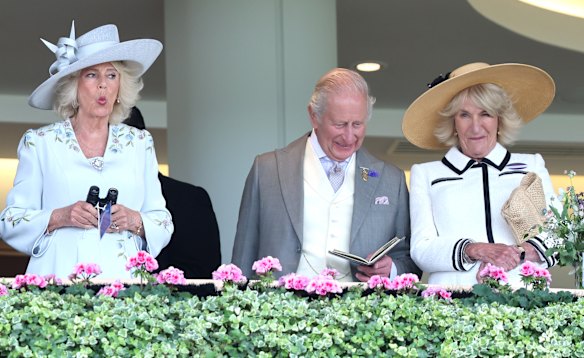 Queen Camilla in an elegant Anna Valentine dress, King Charles in matching spring tones, and the Queen's sister, Annabel Elliot, in the Royal Fence at Royal Ascot.