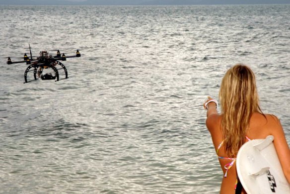 A flying drone is used during a fashion shoot.