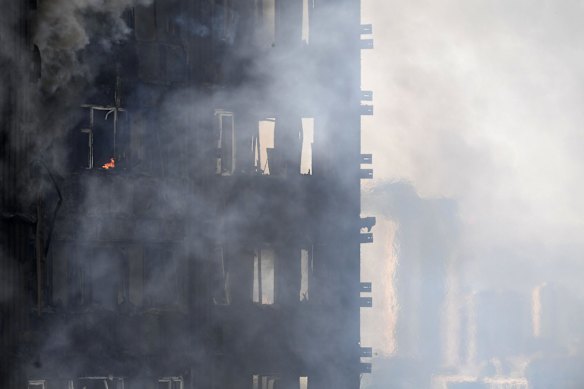 Smoke rises from Grenfell Tower.