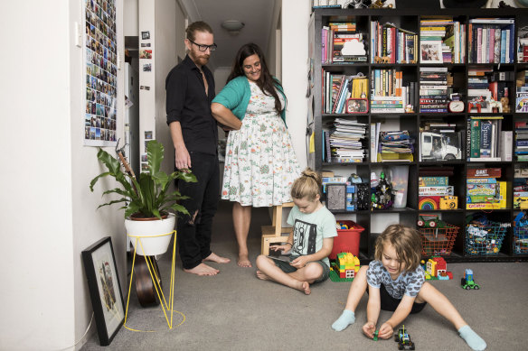 Parents Sara Carkagis and Tom Anderberg with their kids Wolf and Torsten in their apartment in Centennial Park.