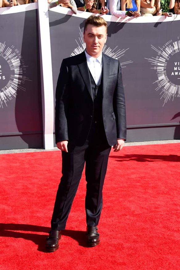 GOOD SUIT, BAD SHOES: Sam Smith's navy three-piece Gucci suit is a total classic ... but those clunky brown leather shoes were not the right footwear choice.