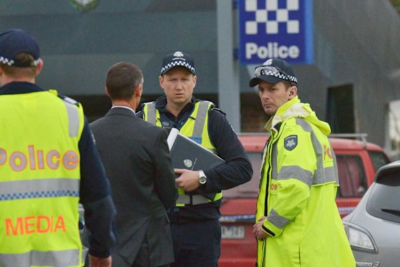 Police outside the Endeavour Hills station where the teenager was shot to death on Tuesday night.