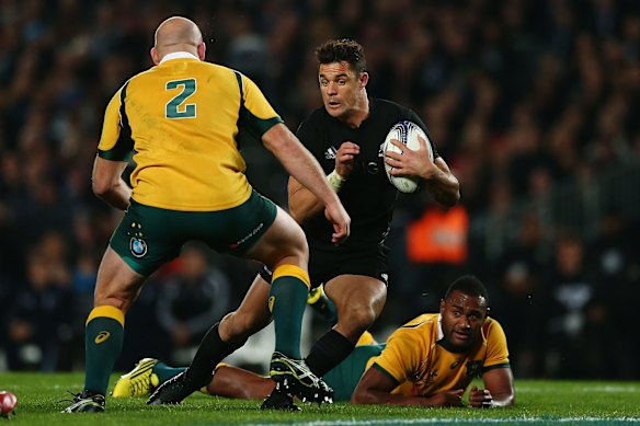 Dan Carter steps Stephen Moore.