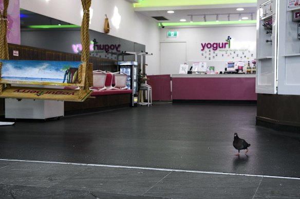 Bondi Beach is quiet, as inclement weather and tough new COVID-19 lockdown restrictions limit people's movement across Greater Sydney.