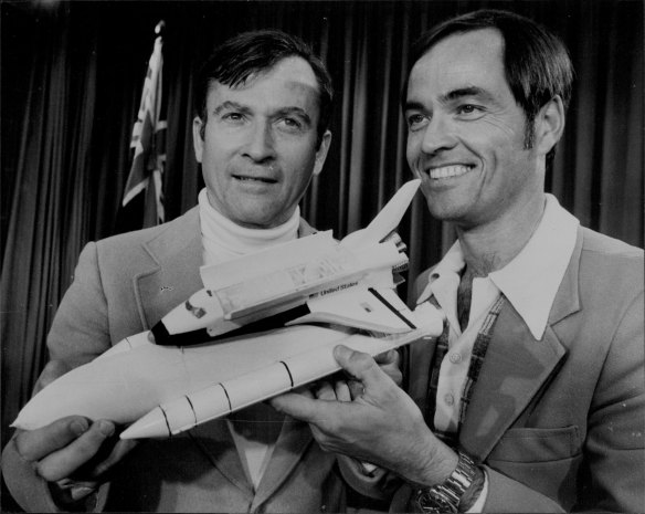 John Young and Robert Crippen with a model of the Shuttle “Columbia” in Sydney on June 27, 1981.