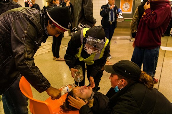 A small group of people clash the police and pepper spray was used.