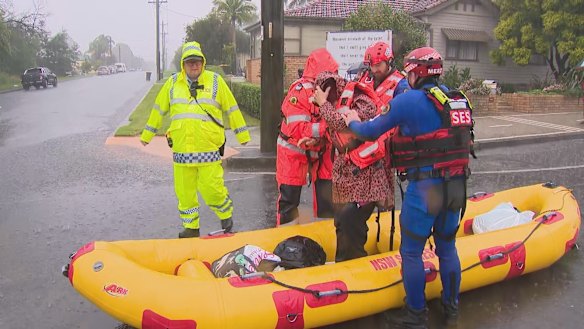 A rescue crew get a person to safety in Dapto.