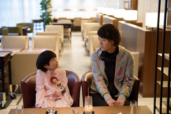 A woman and her daughter relax in the View Gold Lounge, operated by East Japan Railway Company and View Card, at Tokyo Station in Tokyo, Japan. Passengers on the GranClass can check into this lounge at Tokyo Station before boarding.