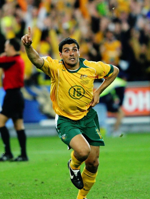 John Aloisi celebrates kicking the winning goal in a penalty shoot out to qualify Australia for the 2006 World Cup.