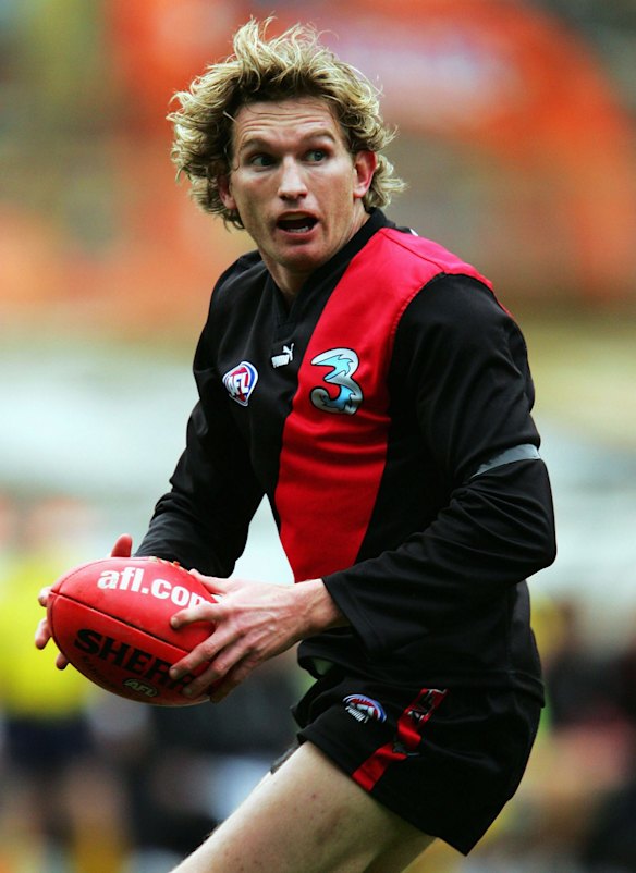 James Hird #5 for the Bombers in action during the round thirteen AFL match between The Essendon Bombers and the Melbourne Demons at the M.C.G. on June 20, 2004 in Melbourne, Australia. 