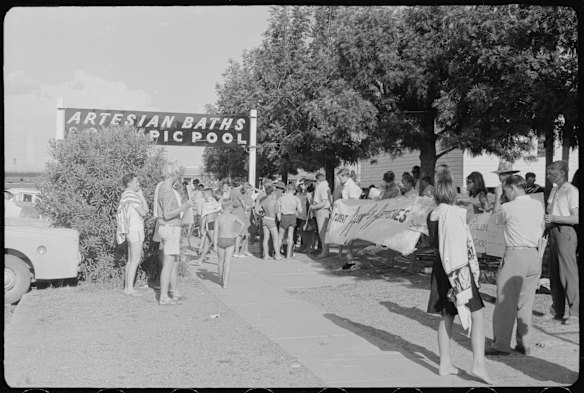 The Freedom Ride '65, Students protesting outside Moree Artesian Baths and Olympic Pool, Moree, 1965. 