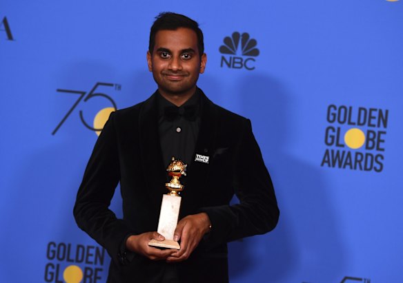 Aziz Ansari with the award for best actor in a television series (musical or comedy) for <i>Master of None</i>.