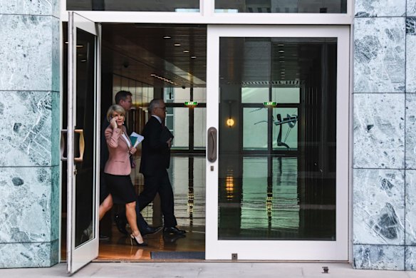 Australian Prime Minister Malcolm Turnbull (right) and Australian Foreign Minister Julie Bishop arrive for a party room meeting at Parliament House in Canberra.